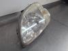 Gebruikte Koplamp links Honda Logo O205074