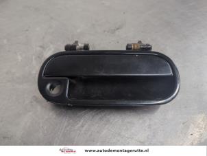 O205080 Gebruikte deurgreep 2deurs rechts Honda Logo