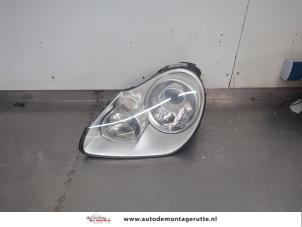 O205198 Gebruikte linker koplamp Porsche Cayenne