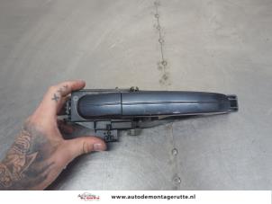 O205293 Gebruikte portiergreep 4deurs rechts-voor Ford Focus