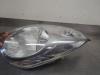 Gebruikte Koplamp links Nissan Note O205703
