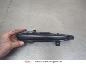 O205655 Gebruikte deurgreep 4deurs rechts-voor Mazda 2