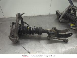 O205628 Gebruikte mac phersonpoot links-voor Porsche Cayenne
