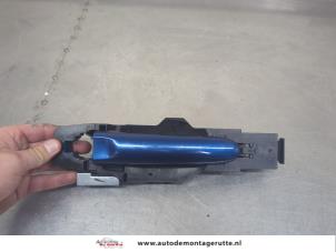 O205674 Gebruikte portiergreep 4deurs links-achter Nissan Micra