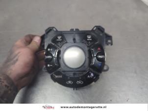 O205784 Gebruikte chaufage bedieningspaneel Nissan Micra