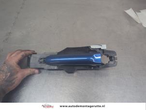 O205785 Gebruikte portiergreep 4deurs links-voor Nissan Micra