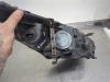 Gebruikte Koplamp links Renault Megane O205799