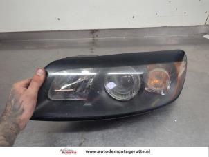 O205849 Gebruikte koplamp links Volvo C30