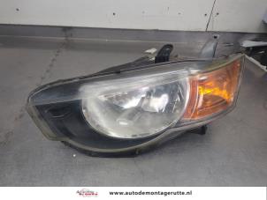 O205927 Gebruikte linker koplamp Mitsubishi Colt