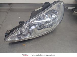 O206024 Gebruikte koplamp links Peugeot 206