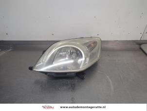 O206085 Gebruikte koplamp links Fiat Fiorino