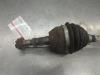 Gebruikte Aandrijfas links-voor Opel Astra O206105