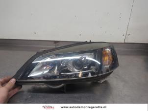 O206157 Gebruikte koplamp links Opel Astra