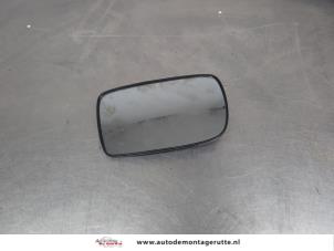 O206302 Gebruikte spiegelglas links Toyota Yaris