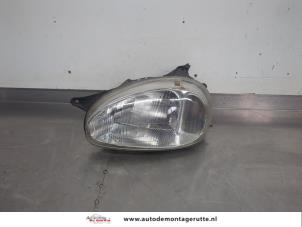 O206377 Gebruikte linker koplamp Opel Corsa