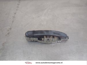 O206402 Gebruikte portiergreep 4deurs links-achter Volkswagen Touran