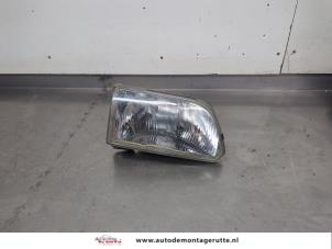 O206416 Gebruikte rechter koplamp Toyota Starlet
