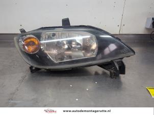 O206425 Gebruikte koplamp rechts Mazda 2