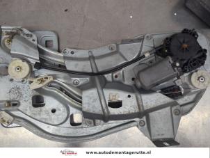 O206466 Gebruikte raammechaniek 2deurs links-achter Renault Megane