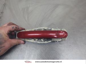 O206542 Gebruikte portiergreep 4deurs links-achter Volkswagen Touran