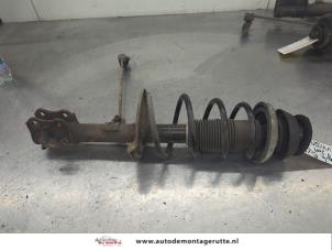 O206639 Gebruikte schokdemperpoot rechts-voor Opel Corsa