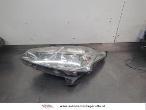 O206764 Gebruikte koplamp links Peugeot 208