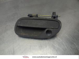 O206828 Gebruikte portiergreep 4deurs links-voor Volvo V40