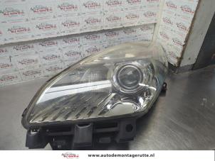 O206837 Gebruikte koplamp links Renault Grand Scenic