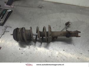 O206863 Gebruikte schokdemperpoot rechts-voor Opel Corsa