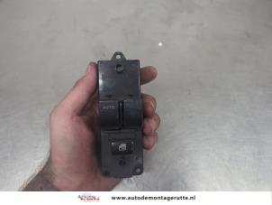 O206989 Gebruikte schakelblok ruiten Mazda Demio
