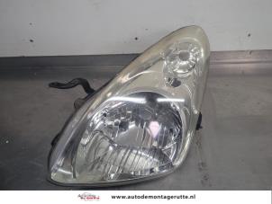 O207008 Gebruikte linker koplamp Nissan Pixo