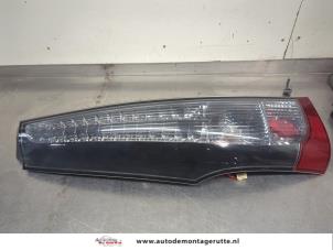 O207095 Gebruikte achterlicht links Mitsubishi Grandis