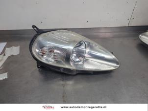 O207099 Gebruikte rechter koplamp Fiat Punto Grande