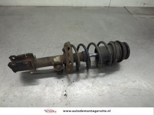 O207141 Gebruikte veerpoot links-voor Opel Corsa