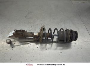 O207165 Gebruikte veerpoot links-voor Opel Corsa