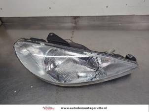 O207310 Gebruikte koplamp rechts Peugeot 206