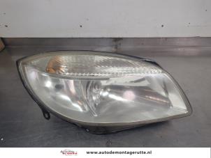O207321 Gebruikte rechter koplamp Skoda Roomster