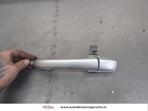 O207406 Gebruikte portiergreep 4deurs rechts-achter Mazda 5