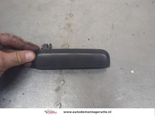 O207444 Gebruikte portiergreep 2deurs rechts Toyota Starlet