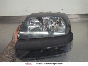 O207565 Gebruikte koplamp links Fiat Doblo