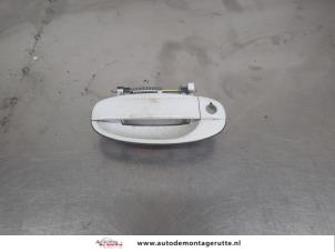 O207760 Gebruikte portiergreep 4deurs links-voor Chevrolet Aveo
