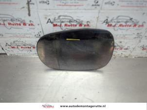 O208078 Gebruikte spiegelglas links Nissan Micra