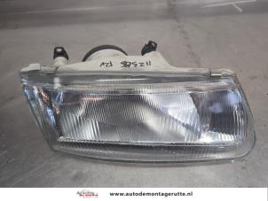 O208138 Gebruikte rechter koplamp Mitsubishi Carisma