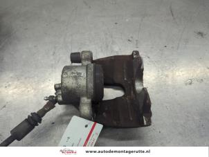 O208150 Gebruikte remklauw (tang) links-voor Ford Focus