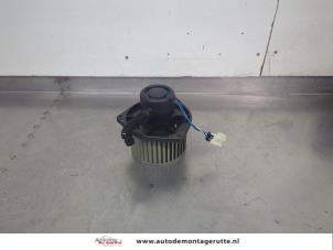 O208198 Gebruikte kachel ventilatiemotor Nissan Micra