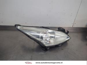 O208199 Gebruikte rechter koplamp Peugeot 5008