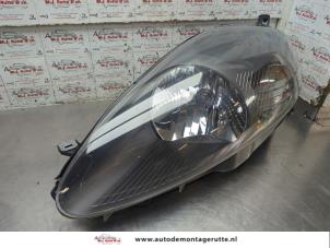 O208317 Gebruikte linker koplamp Fiat Punto Grande