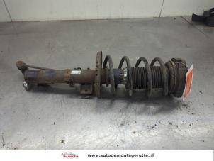 O208406 Gebruikte veerpoot links-voor Seat Ibiza