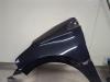 Gebruikte Spatbord links-voor Peugeot 208 O208530