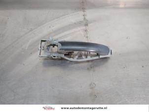 O208587 Gebruikte portiergreep 2deurs links Volkswagen Transporter